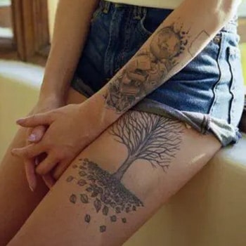 tatouage Arbre le long de la cuisse