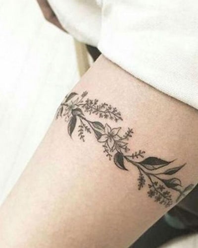 tatouage Couronne autour de la cuisse