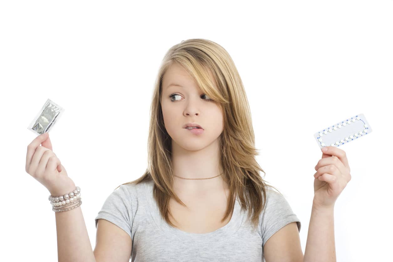 A Woman Choosing Between Birth Control Methods