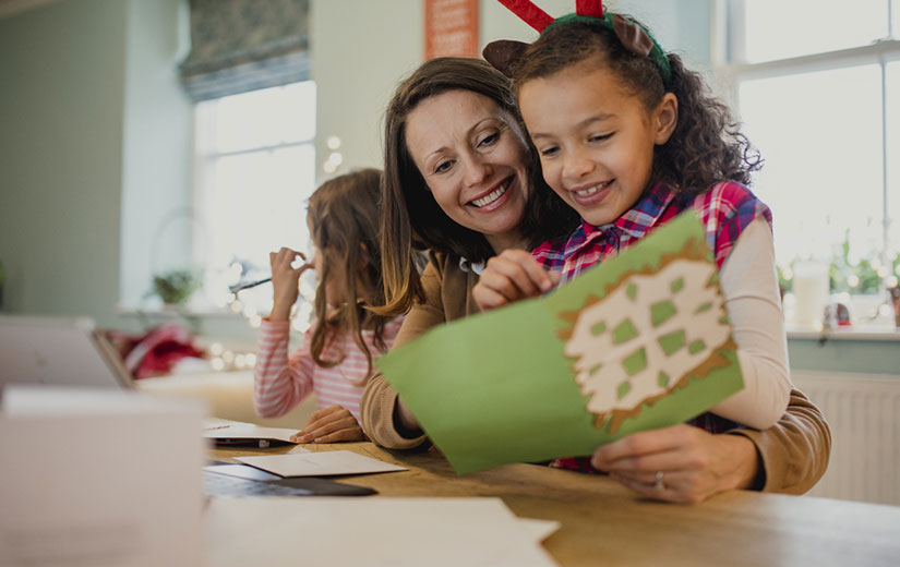 écrire une Carte de Noel avec les enfant