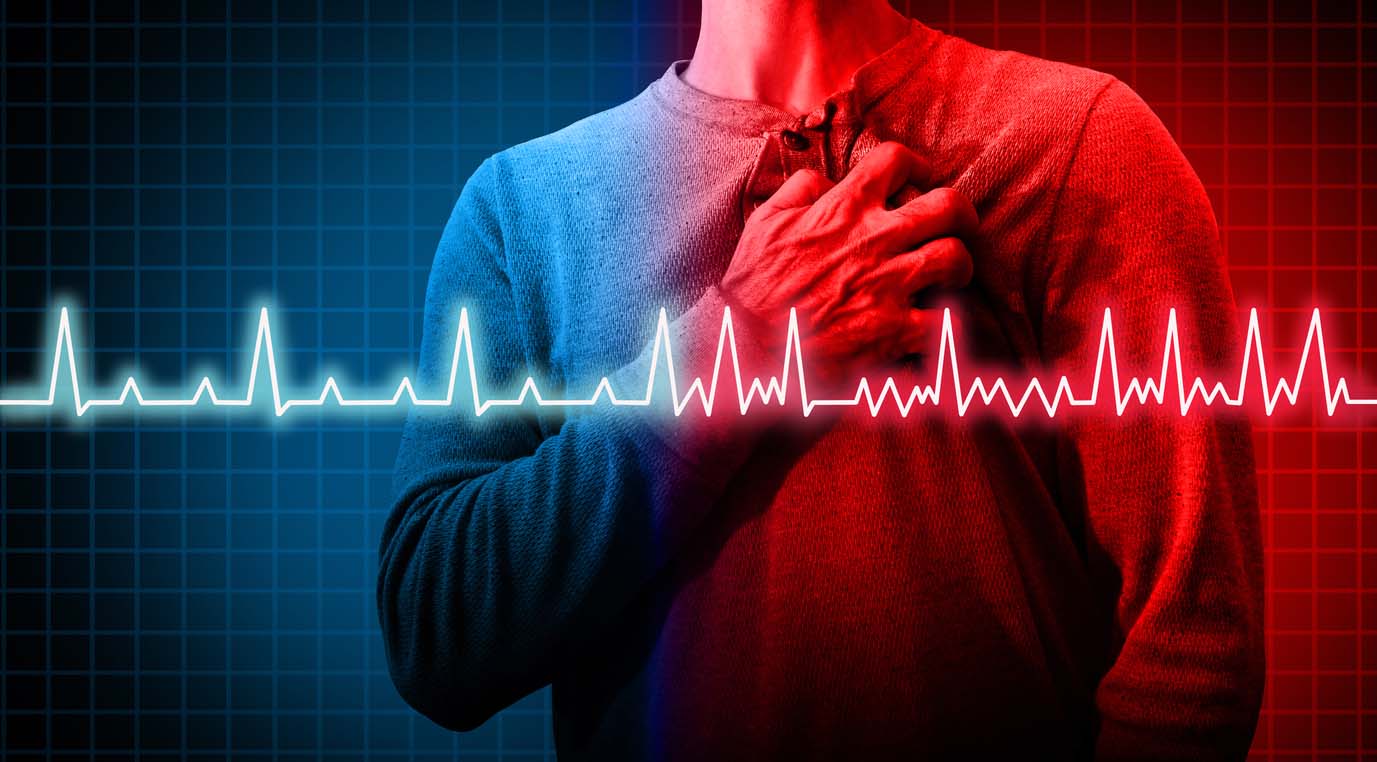homme se tenant la poitrine avec dessin d’électrocardiogramme