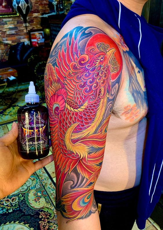 Tatouage Phoenix Rouge Sur Le Bras