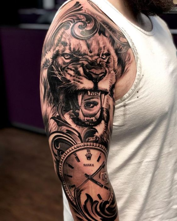 Tatouage Lion & Montre Rolex Sur Le Bras