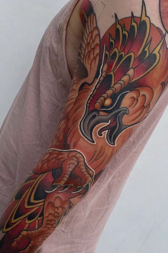 Tatouage Phoenix Orange Avec Griffes Sur Le Bras