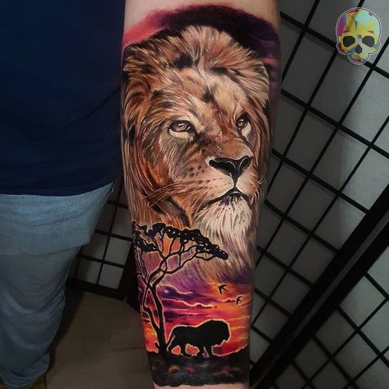 Tatouage Avec Deux Lions & Savane Sur L’avant Bras