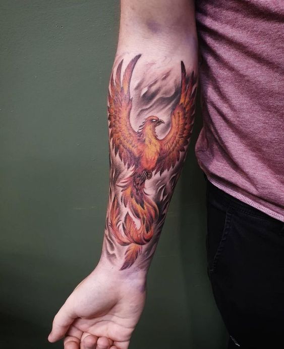 Tatouage Phœnix Orange & Flamme Sur L’avant Bras