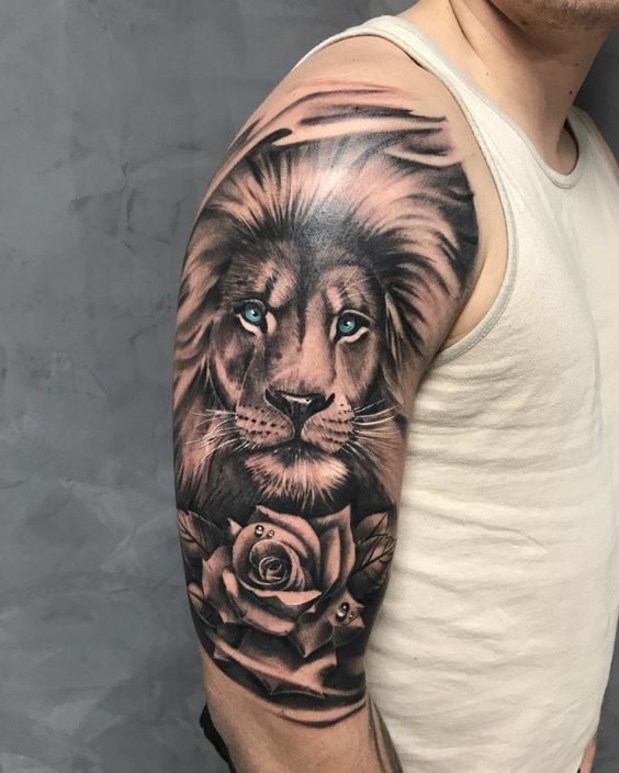 Tatouage Tête De Lion Et Rose Sur Le Bras