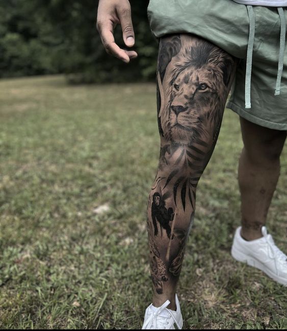 Tatouage Lion & Singe Sur La Cuisse