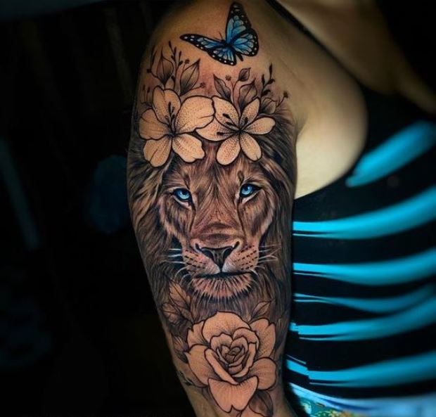 Tatouage Lion, Fleurs Et Papillon Bleu Sur Le Bras