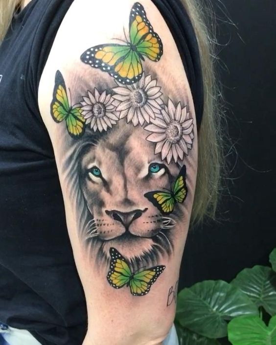 Tatouage Lion & Papillons Verts Sur Le Bras