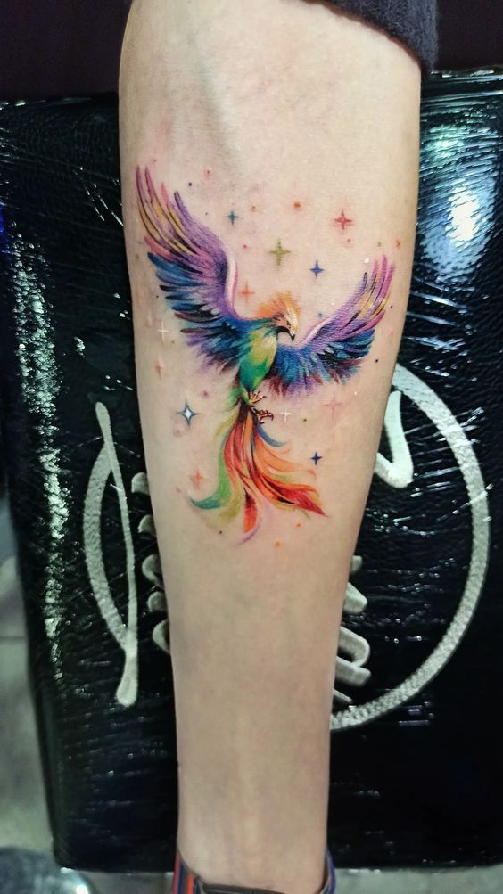 Tatouage Phœnix Arc En Ciel étoilé Sur L’avant Bras