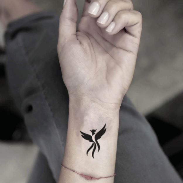 Tatouage Phœnix Noir Très Discret Sur L’avant Bras
