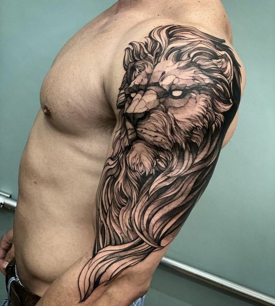 Tatouage Lion Graphique Sur Le Bras