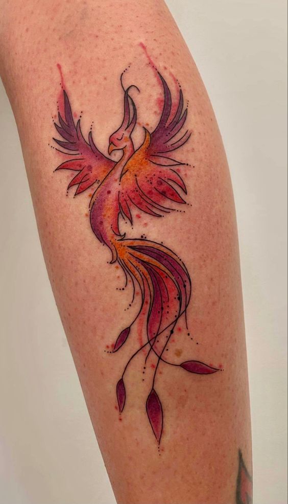 Tatouage Phœnix Majestueux Sur La Jambe