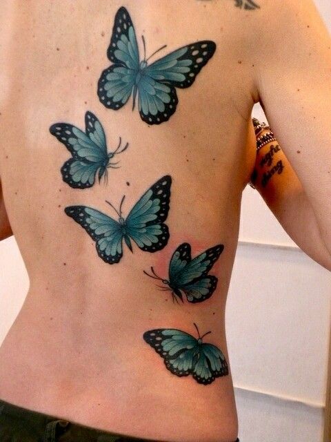 Tatouage Papillons Argus Bleus Sur Le Dos 