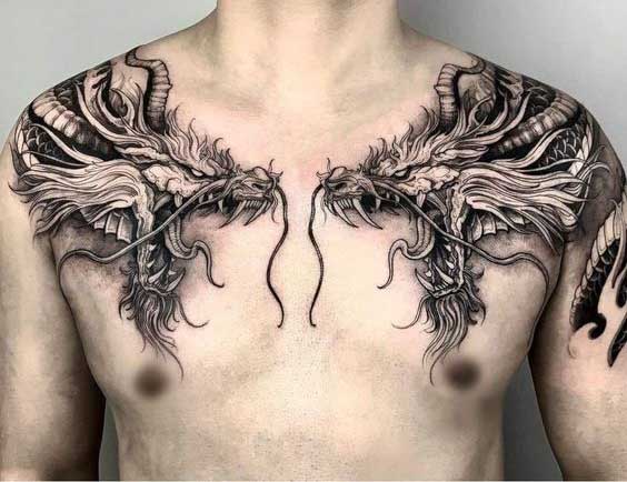 Tatouage Deux Dragons En Noir Et Gris Sur Le Torse