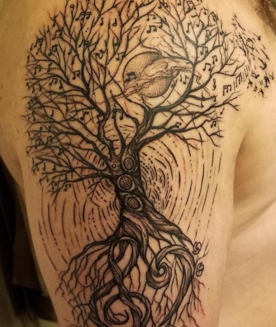 Tatouage Arbre De Vie Avec Notes De Musique Sur Le Bras