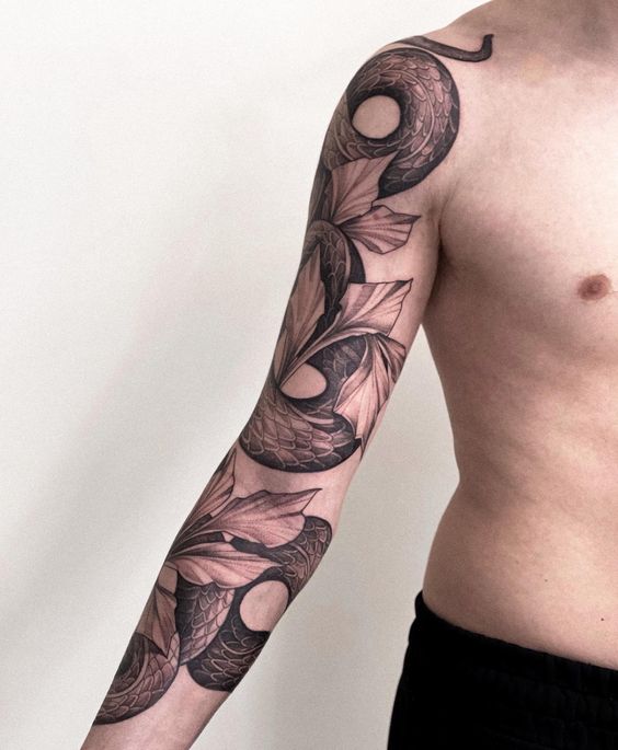 Tatouage Serpent Et Feuilles Sur Le Bras