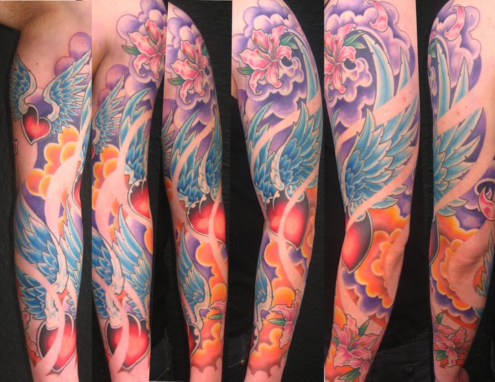 Tatouage Coeurs Ailés Sur Le Bras