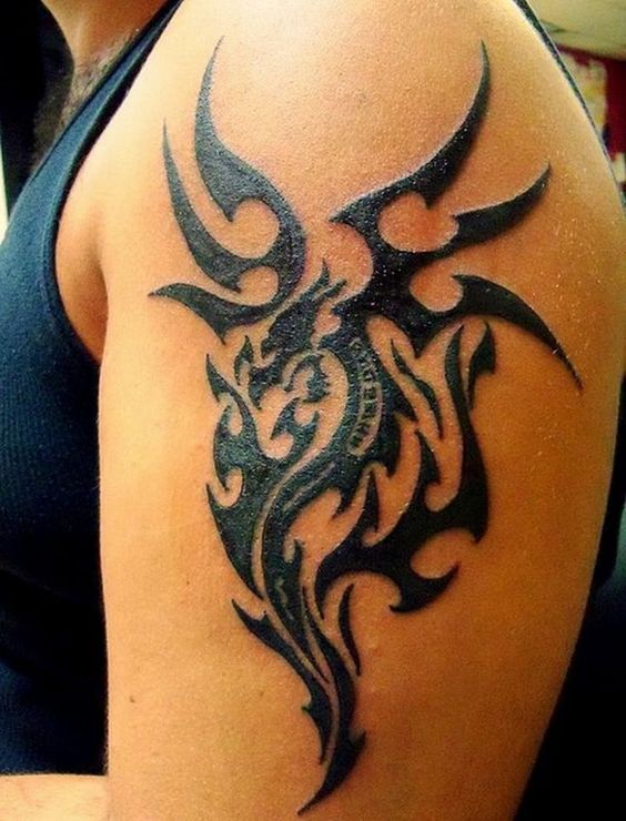 Tatouage Dragon Tribal Sur Le Bras
