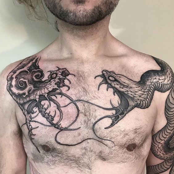 Tatouage Serpents Mutants Sur Le Torse