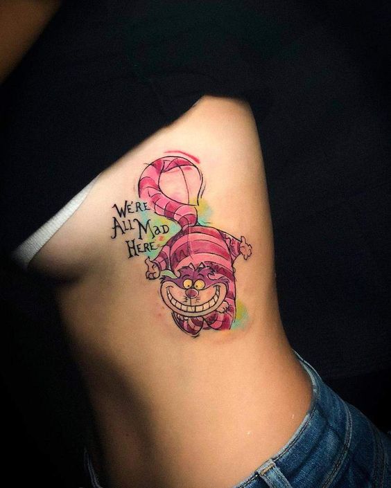 Tatouage Le Chat Du Cheshire Sur Les Côtes