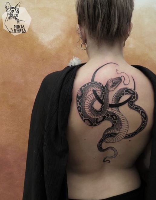 Tatouage Boa Et Croissant De Lune Sur Le Dos