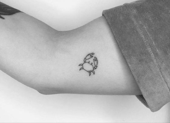 Tatouage Crabe Discret Sur Le Bras