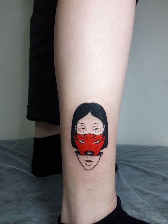 Tatouage Femme à Deux Visages Sur La Jambe