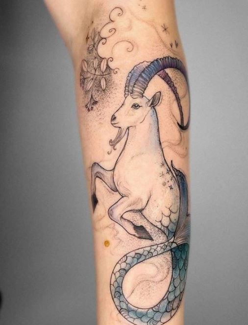 Tatouage Poisson Chèvre, étoiles Et Nuages Sur Le Mollet
