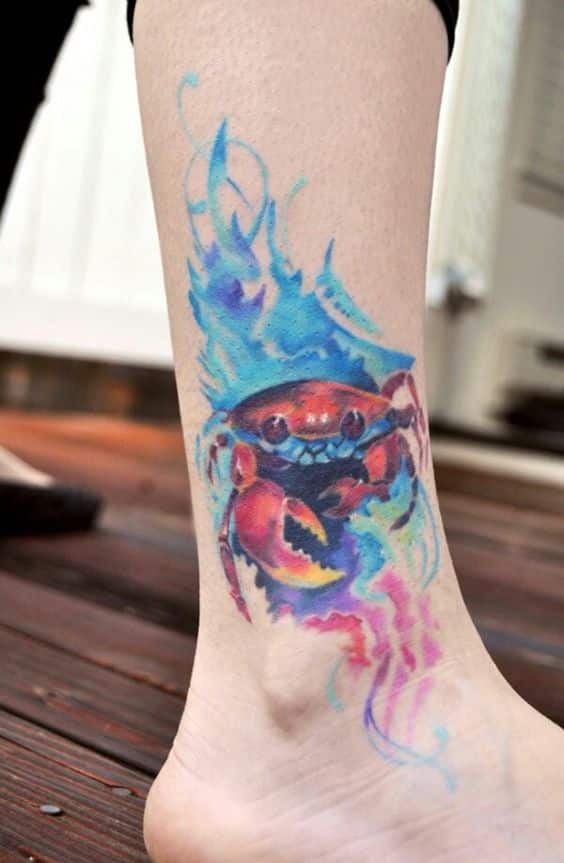 Tatouage Signe Cancer En Aquarelle Multicolore Sur La Jambe