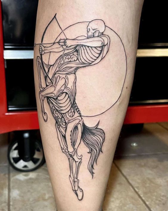 Tatouage Cadavre De Centaure Archer Sur Le Mollet