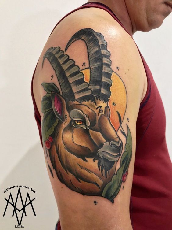 Tatouage Bélier Et Soleil Sur Le Bras