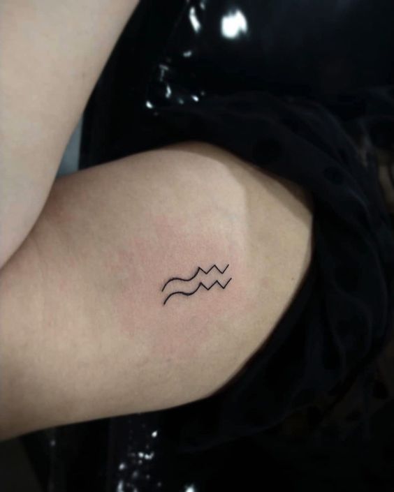Signe Verseau Minimaliste Sur Le Bras