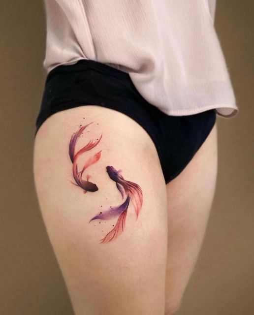 Tatouage Poissons En Aquarelle Sur La Cuisse
