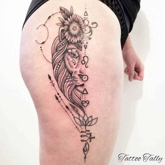 Tatouage Signe Lion Avec Ornements Sur La Cuisse