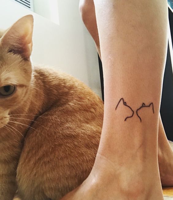 Tatouage Silhouettes De Chats Sur La Jambe