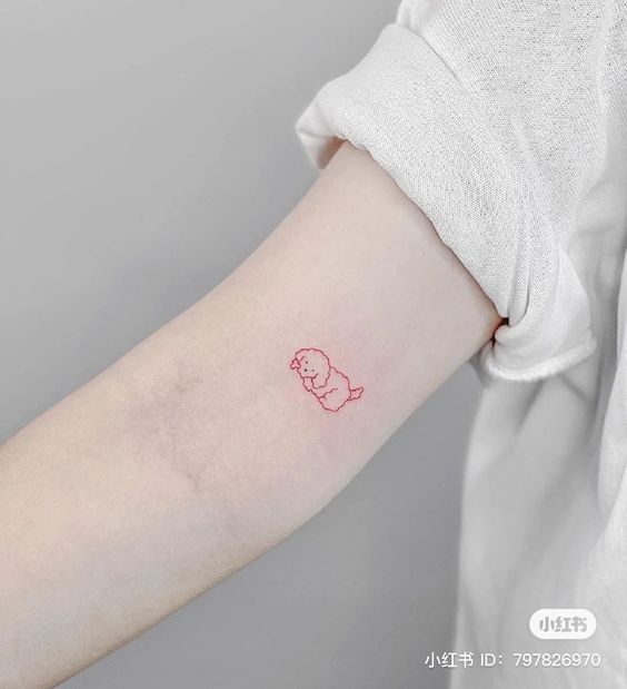 Tatouage Chien Minimaliste Rouge Sur Le Bras