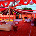 A Room Filled With Lots Of White Couches