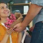 Man Gives Woman A Bouquet Of Pink Roses